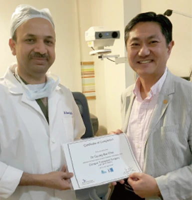 Director Choi — surgical training at Apollo Hospitals, India, supervised by Dr. Rajesh Fogla